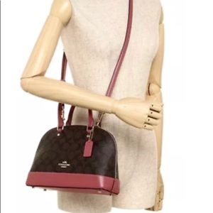 Mini hot pink/brown signature Coach Satchel -USED